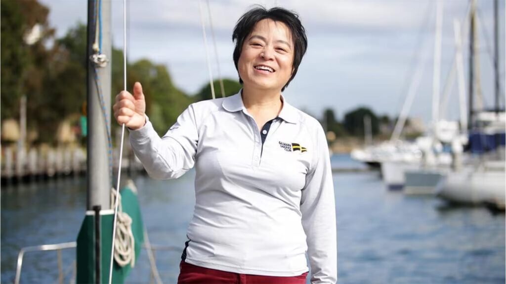 Jiang Lin and co-skipper on Min River at the finish of the Sydney to Hobart race.
