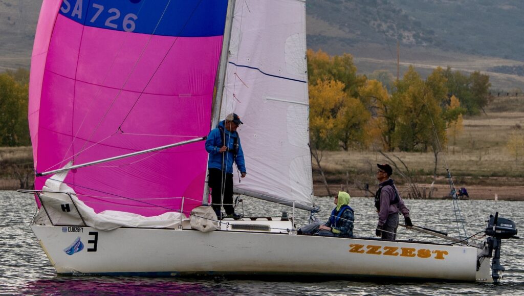 A sailing instructor and his students