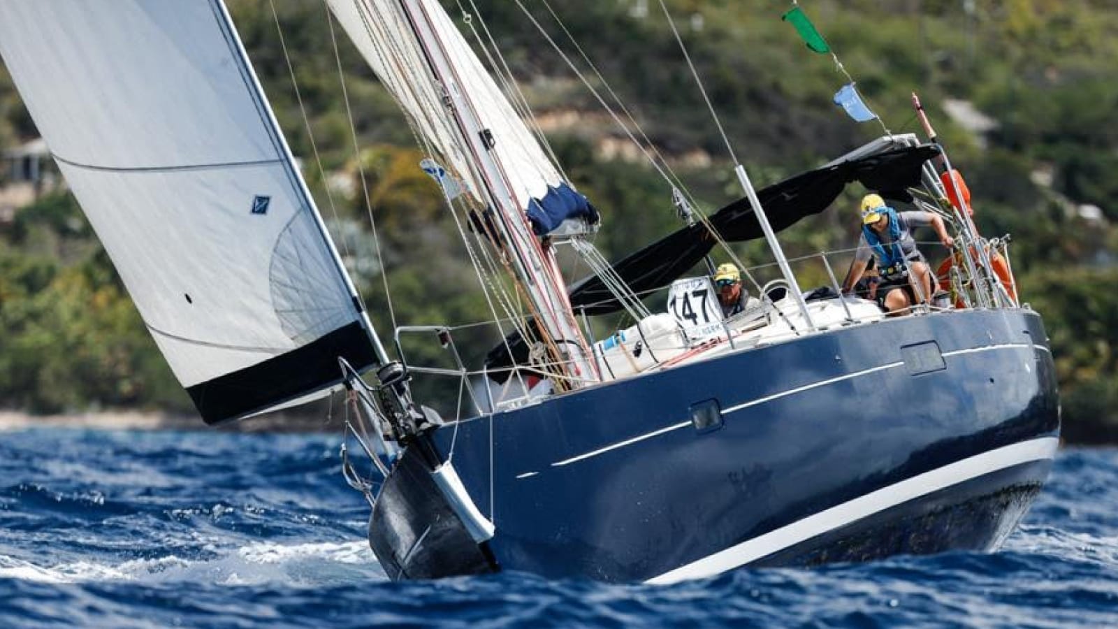 SAILBOAT HEELED OVER IN THE WIND