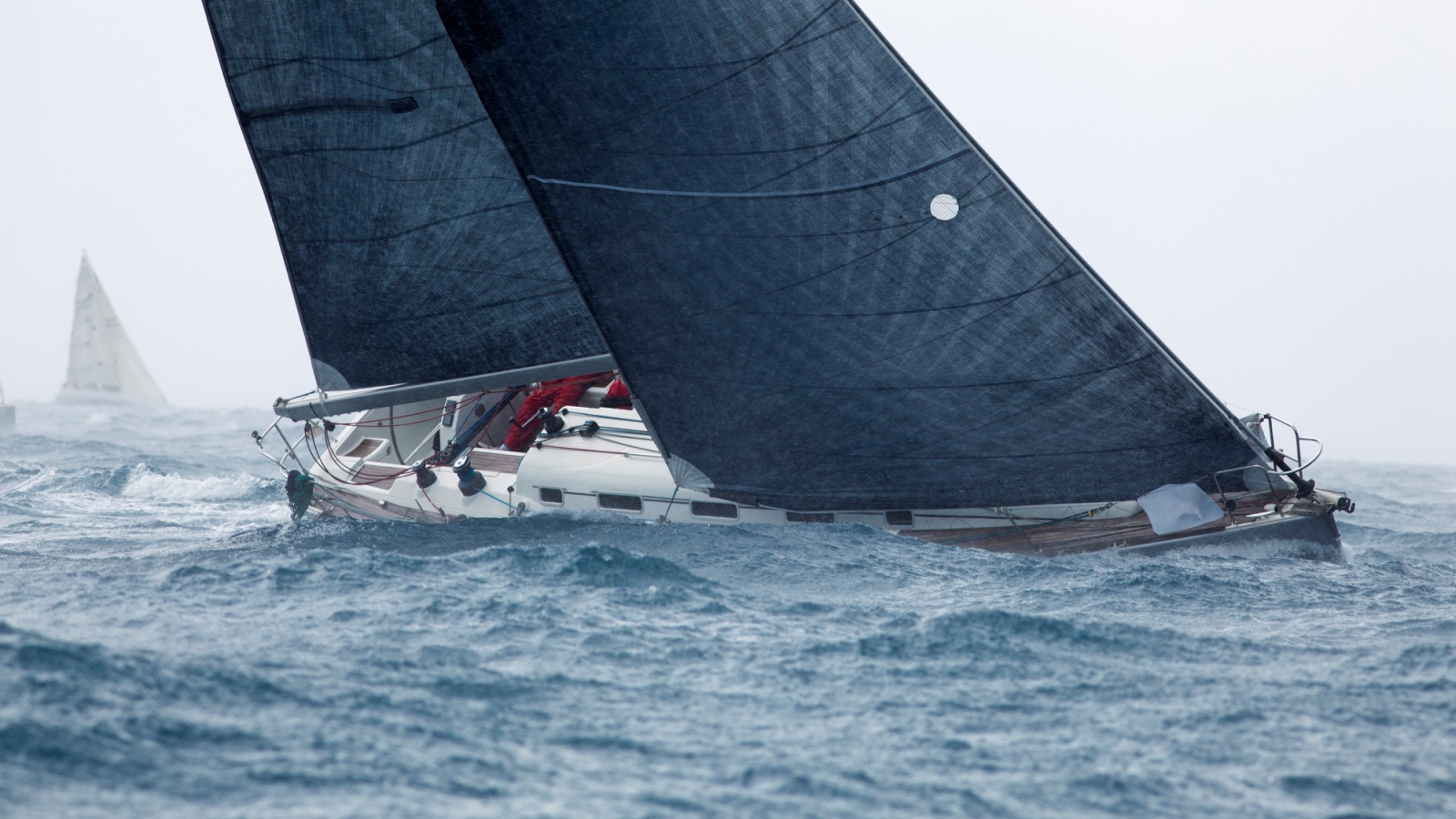 sailboat racing in a storm