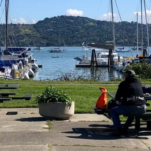 ASA Instructor Stephen Spoja demonstrates how to lasso a dock cleat at Modern Sailing School & Club photo by Mary Elkins